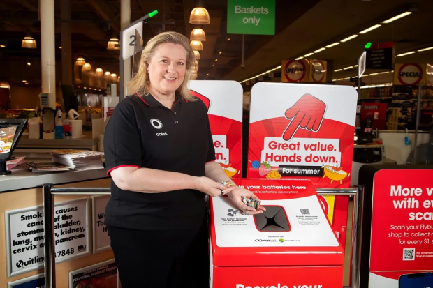 Brooke Donnelly, General Manager of Sustainability at Coles, with a new battery recycling bin.
